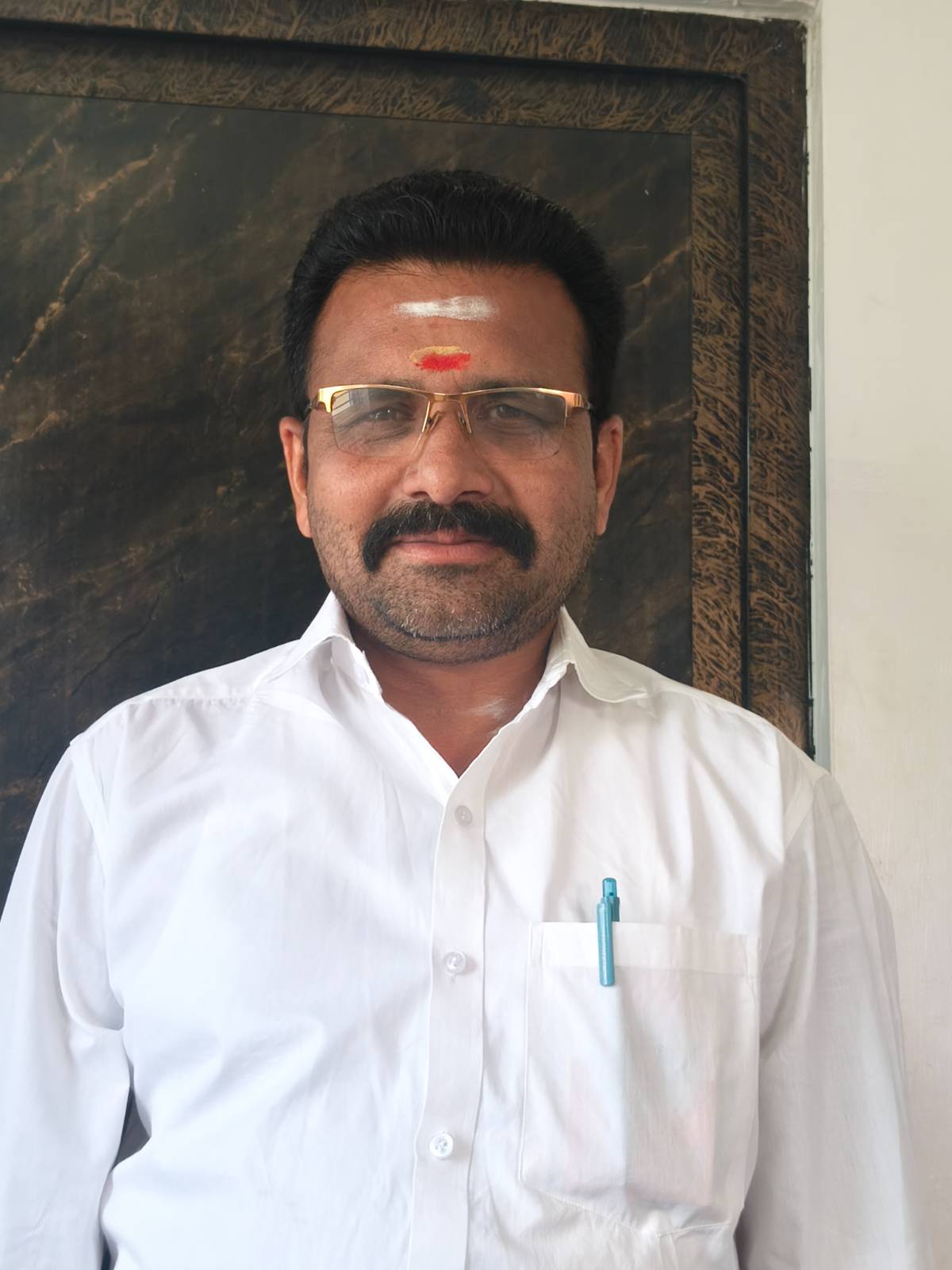 Thambi P